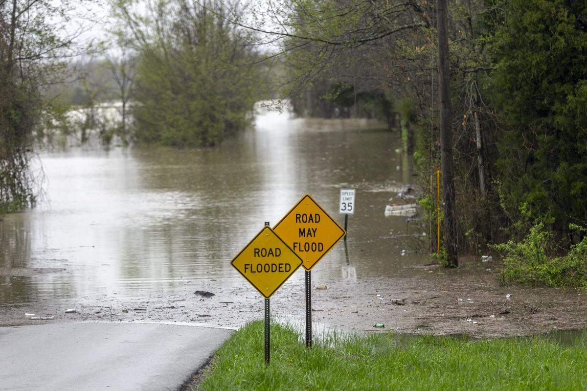 A section of Lower Colesburg Road is flooded in Hardin County, Ky., on Sunday, April 6, 2025.