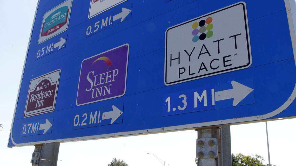 Blue signs along interstates, like this one advertising lodging at exit 108 on I-75 in Lexington, point motorists to nearby  amenities and attractions. Distance to the exit is a factor in a business being eligible to advertise on such signs. 