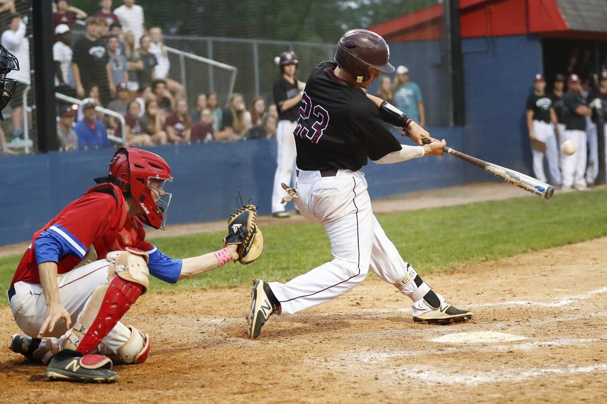 Tates Creek’s Colin Burgess (23) hit a grand slam that helped decide the 43rd District title on Tuesday.