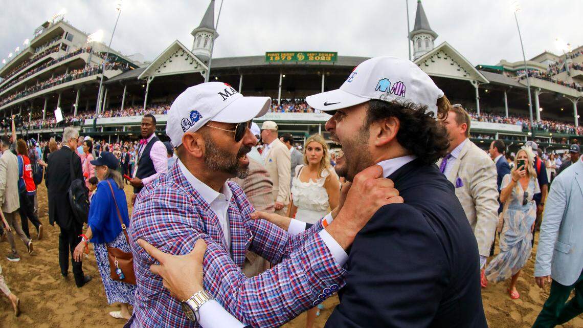 Part-owner and assistant trainer Gustavo Delgado Jr., right, celebrates after Mage wins the 149th running of the Kentucky Derby at Churchill Downs in Louisville, Ky., on Saturday, May 6, 2023.