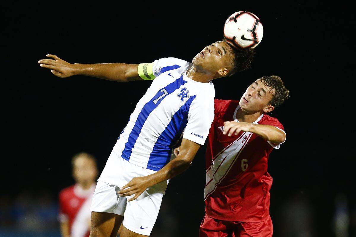 Kentucky forward  JJ Williams, who leads the Wildcats with nine goals this season, headed the ball past Indiana defender Jack Maher on Wednesday night. Williams scored twice against the Hoosiers.