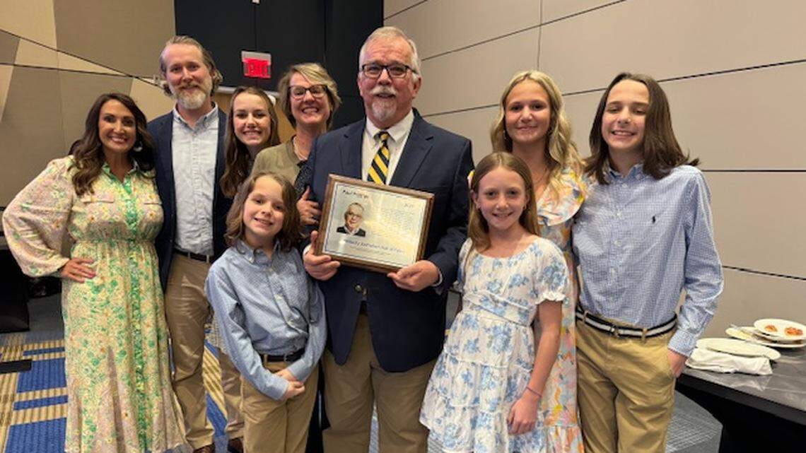 Paul Prather celebrates his induction into the Kentucky Journalism Hall of Fame in 2024.