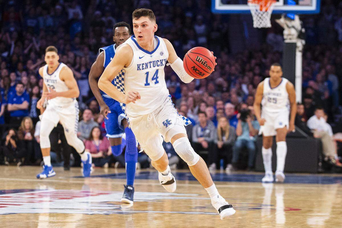 Kentucky Wildcats guard Tyler Herro (14) drove down court past Seton Hall Pirates defenders during the Citi Hoops Classic Saturday at Madison Square Garden in New York City. Seton Hall beat Kentucky 83-84 in overtime.