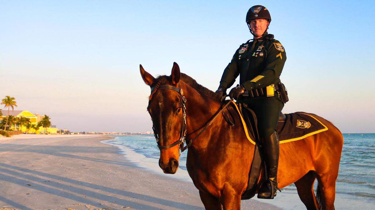 Corporal Aaron Eubanks adopted Track Shill and renamed him Maverick. The police horse was invited to participate in Super Bowl crowd control this week before suffering an injury.