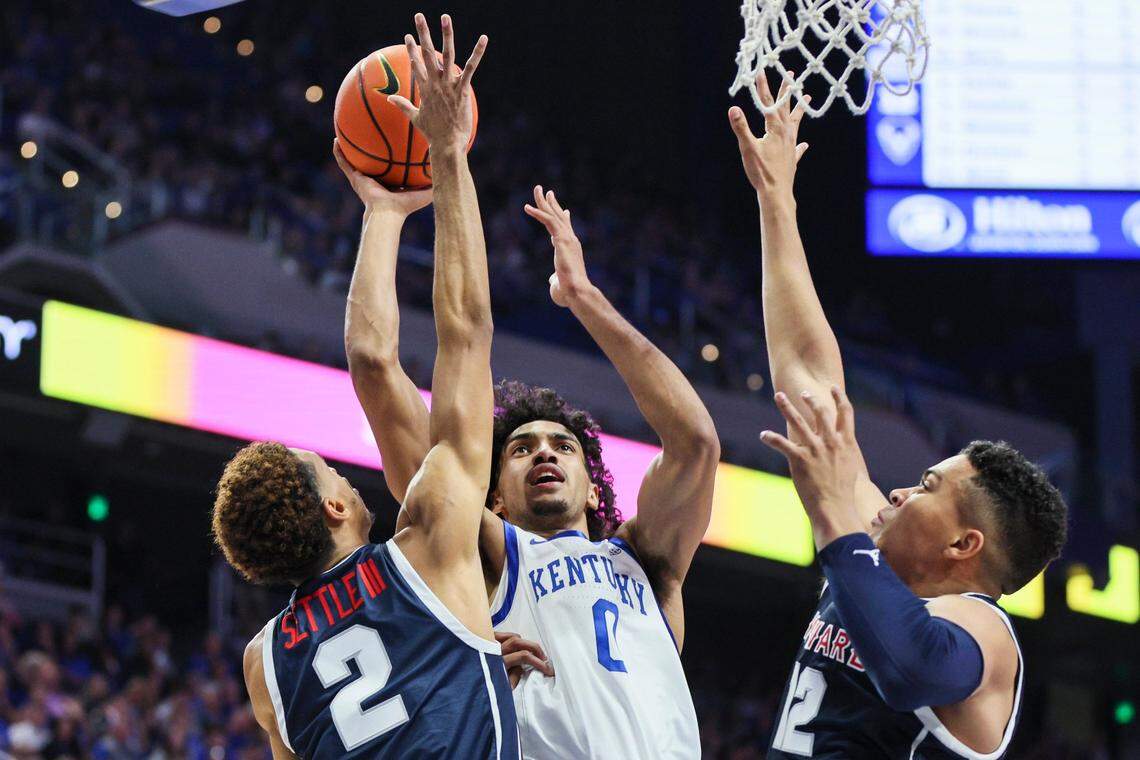 Jacob Toppin (0) shoots against Howard’s Steve Settle III on Monday night. Toppin recorded a double-double with 15 points and 11 rebounds.