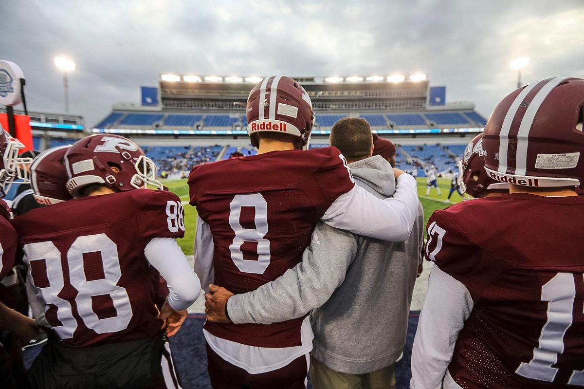 Pikeville quarterback Isaac McNamee (8) and his dad, head coach Chris McNamee, watched the final seconds of Friday's win at Kroger Field. Isaac McNamee was named the game's MVP.