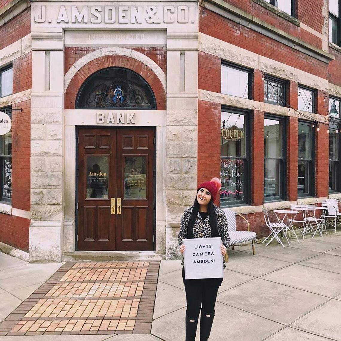 Emily Riddle in front of her business The Amsden at 151 South Main Street in Versailles. Part of the building will be used to film Drew Barrymore’s movie “The Stand-In” next week.