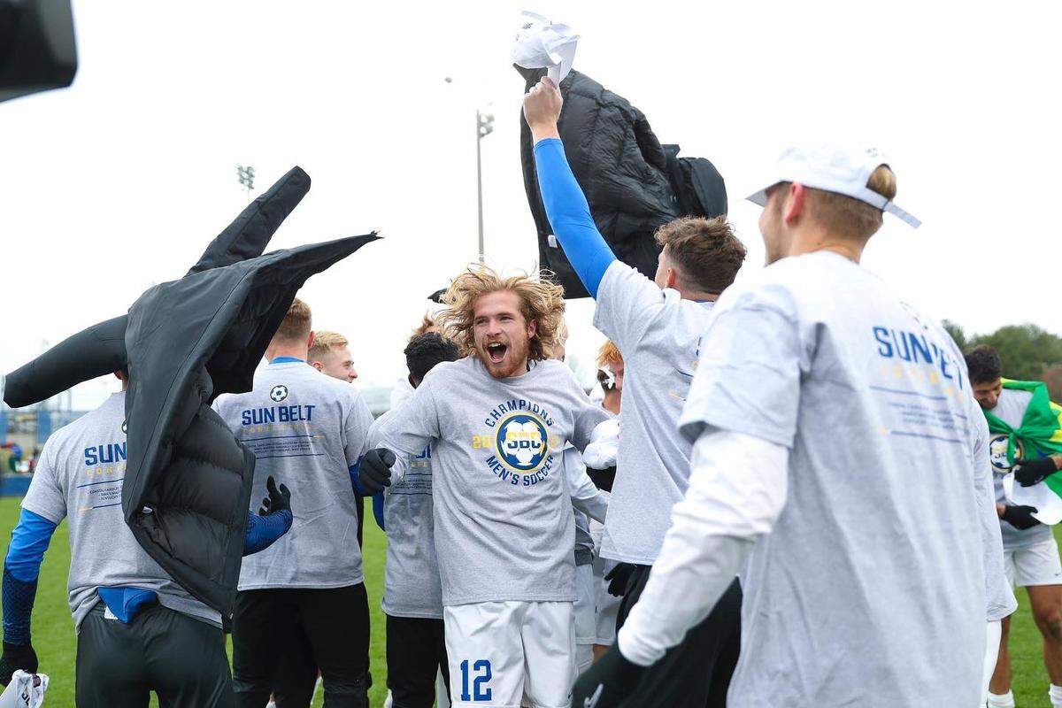 Kentucky players celebrate after winning the Sun Belt Conference Tournament championship and the league’s automatic bid to the NCAA Tournament at UK’s Bell Soccer Complex on Sunday.