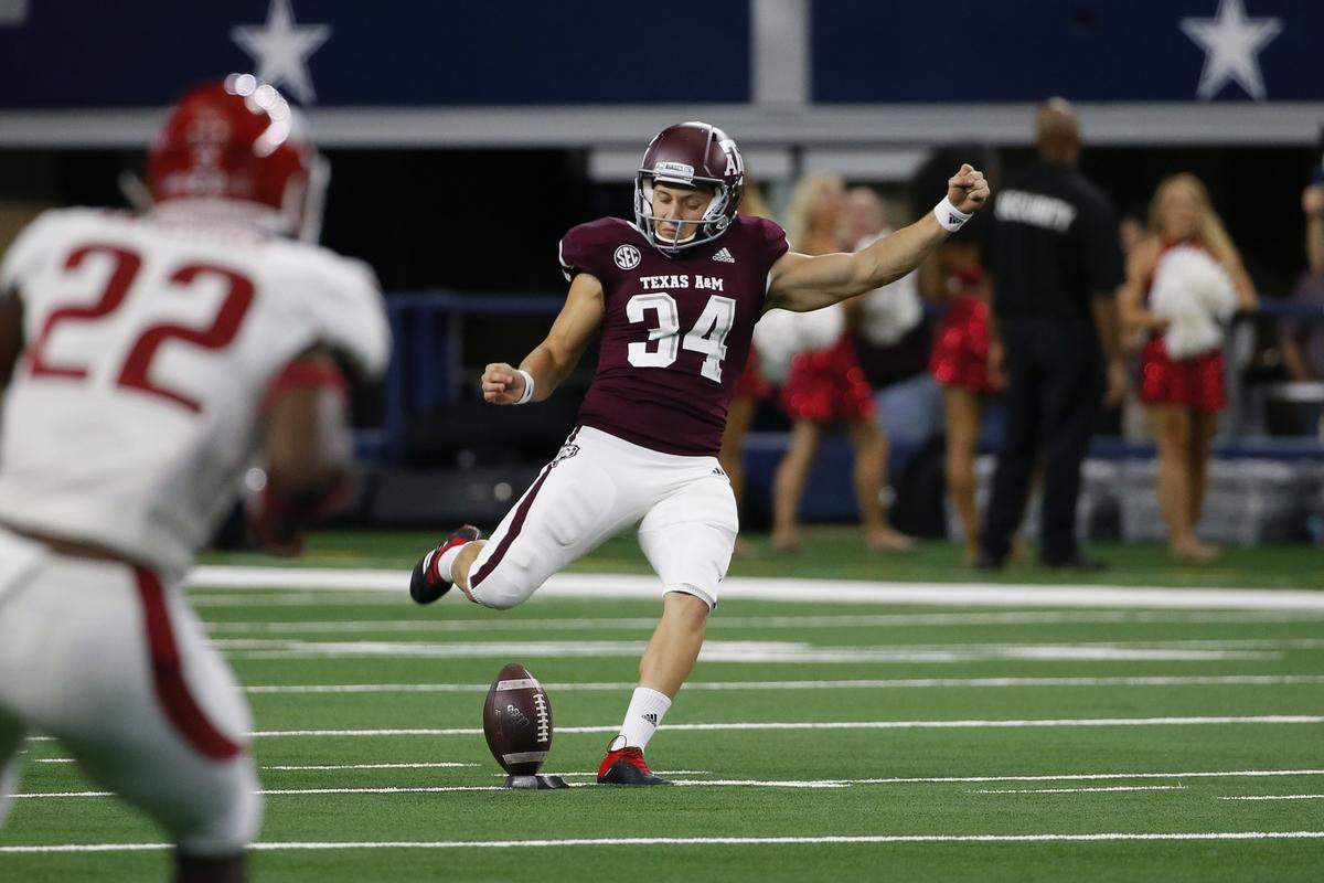 In addition to handling kickoff duties, Texas A&M’s Braden Mann (34) leads the nation in punting with an average of 53.6 yards a kick.