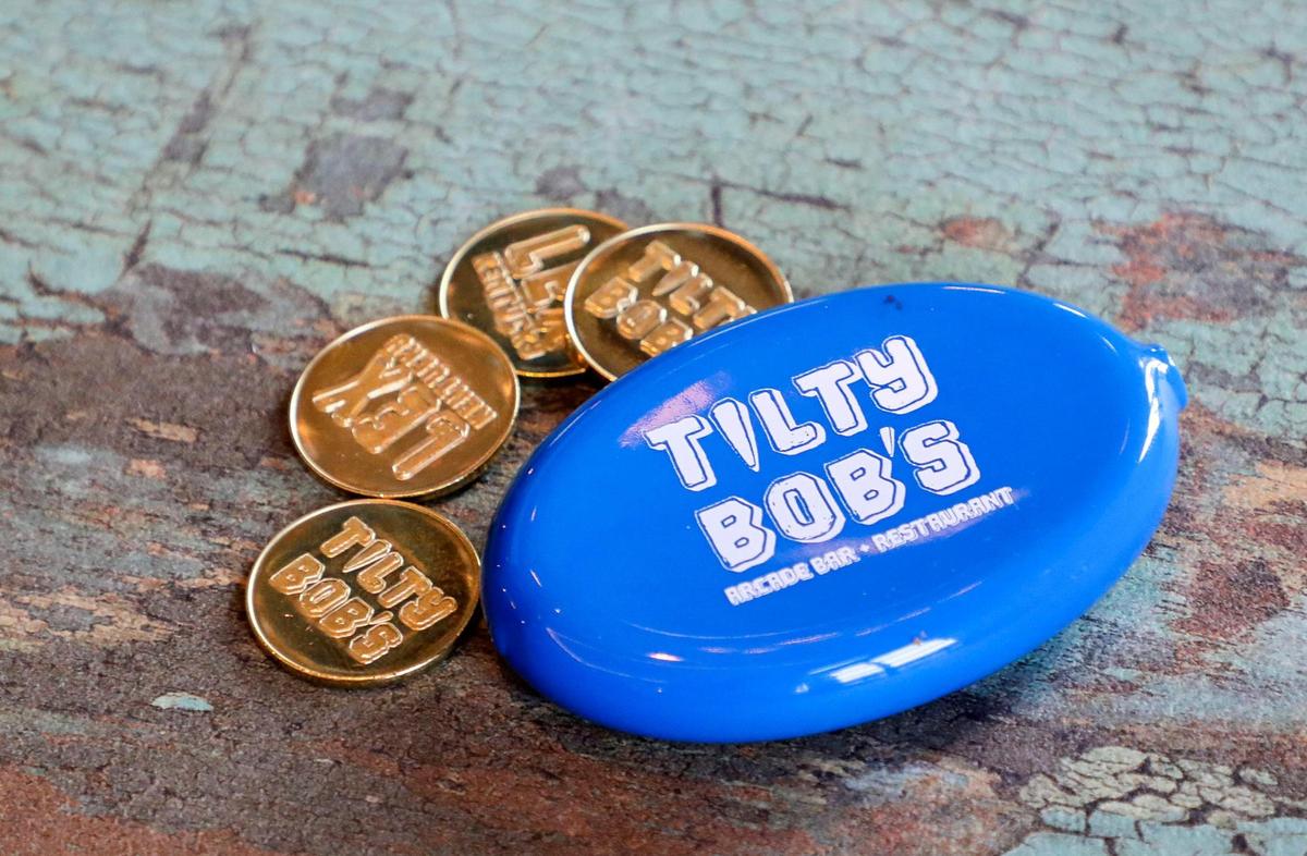 Tilty Bob’s vintage arcade bar and restaurant uses tokens instead of quarters for its games — one token equals one quarter and most games cost one token.