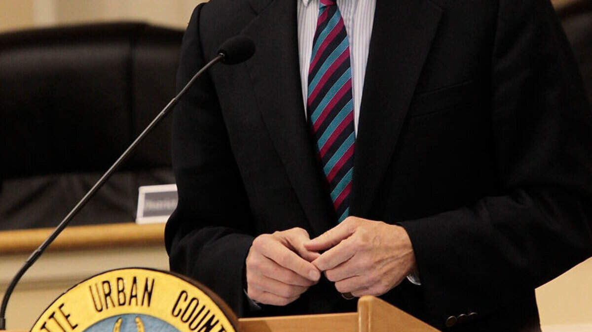 Mayor Jim Gray announced decreased spending including layoffs, closing two pools and more to balance the budget at Urban County Council chambers in Lexington Tuesday. Photo by Pablo Alcala | Staff