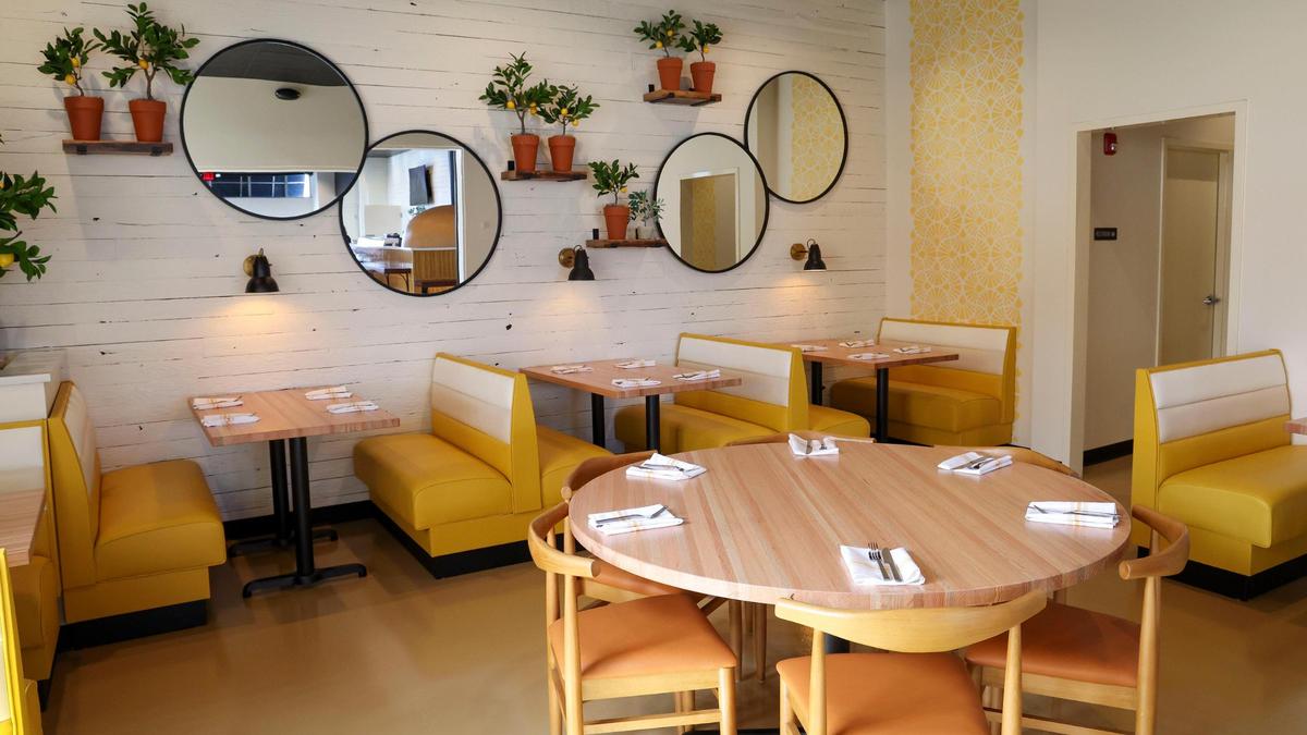 The dining room for Crust pizza and pasta restaurant was done by interior designer Julie Rainey, President of r2 studio, inc. She did other restaurants in the Bella group including Bella Cafe & Grille.