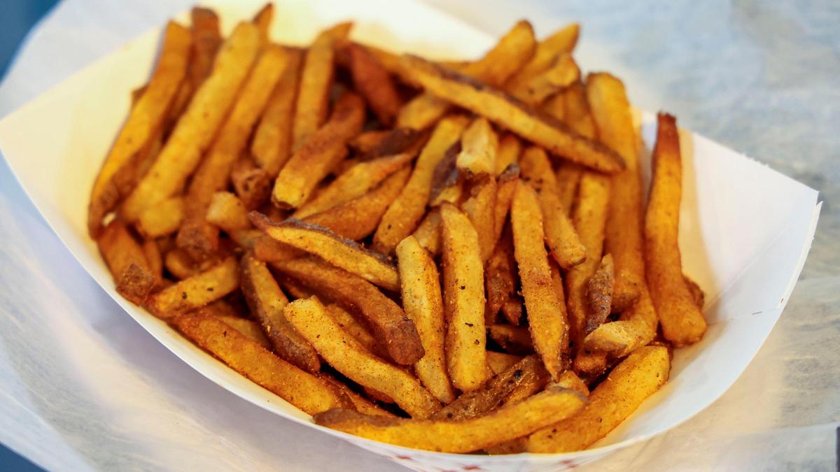A large order of French fries ($4) with Cajun seasoning from JJ burgers and fries The new restaurant cuts fresh potatoes for the fries daily.