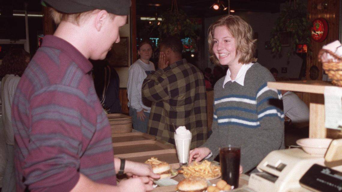 University of Kentucky sophomore Ami Parker laughs after being announced as a “Ho-Virgin” by Tolly-Ho employee Wes Bishop. February 27, 1998