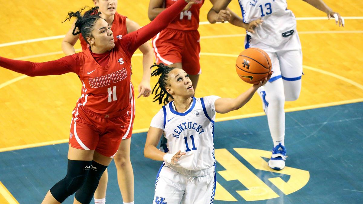 Kentucky’s Jada Walker drives against Radford’s Ashlyn Traylor, left, during a game at Memorial Coliseum on Nov. 7. After a strong freshman season, Walker has continued her stellar play for UK as a sophomore.
