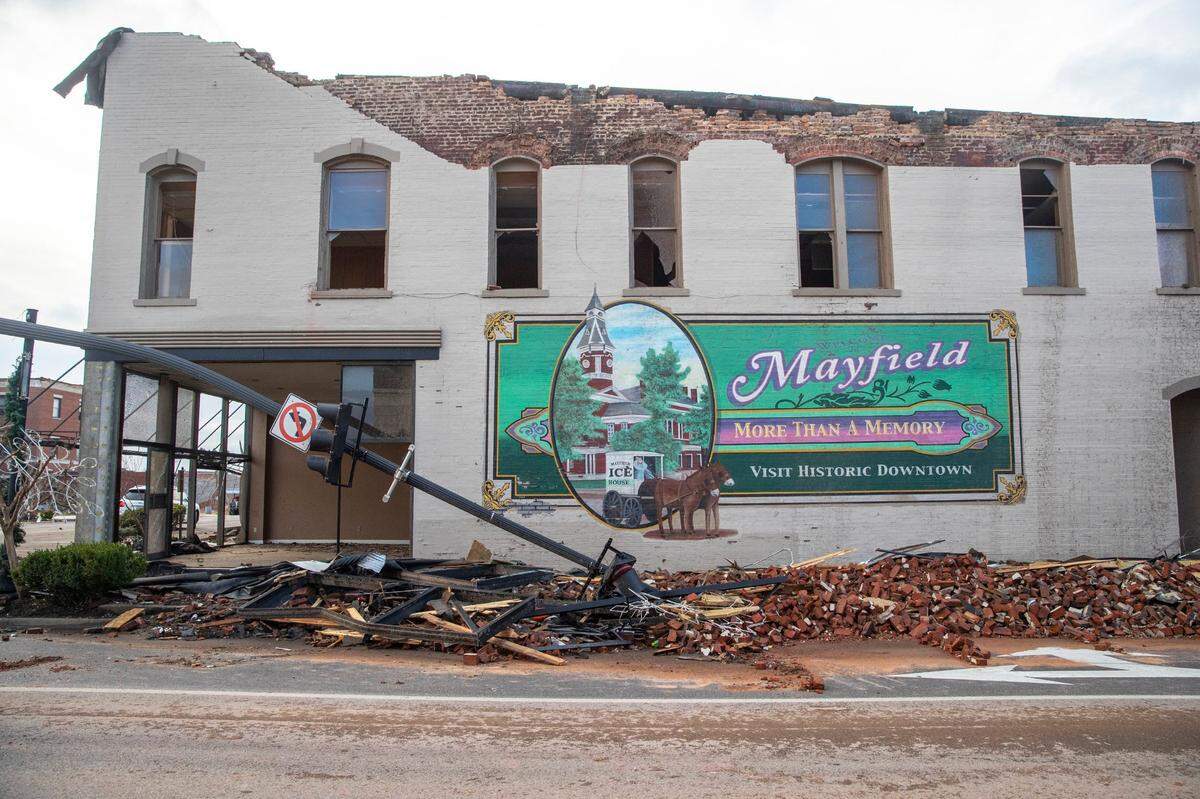A mural on the side of a building at the corner of 7th Street and West Broadway in downtown Mayfield, Dec. 10, 2021.