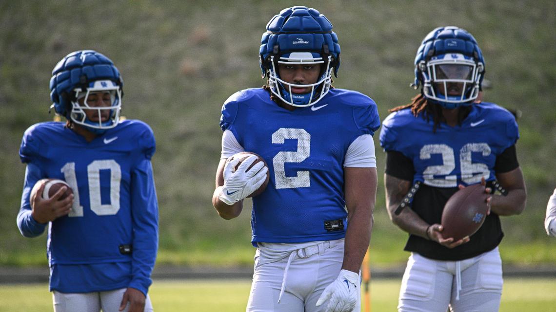 Kentucky running backs Jamarion Wilcox (10), Dante Dowdell (2) and Jason Patterson (26) are battling for the starting running back job.