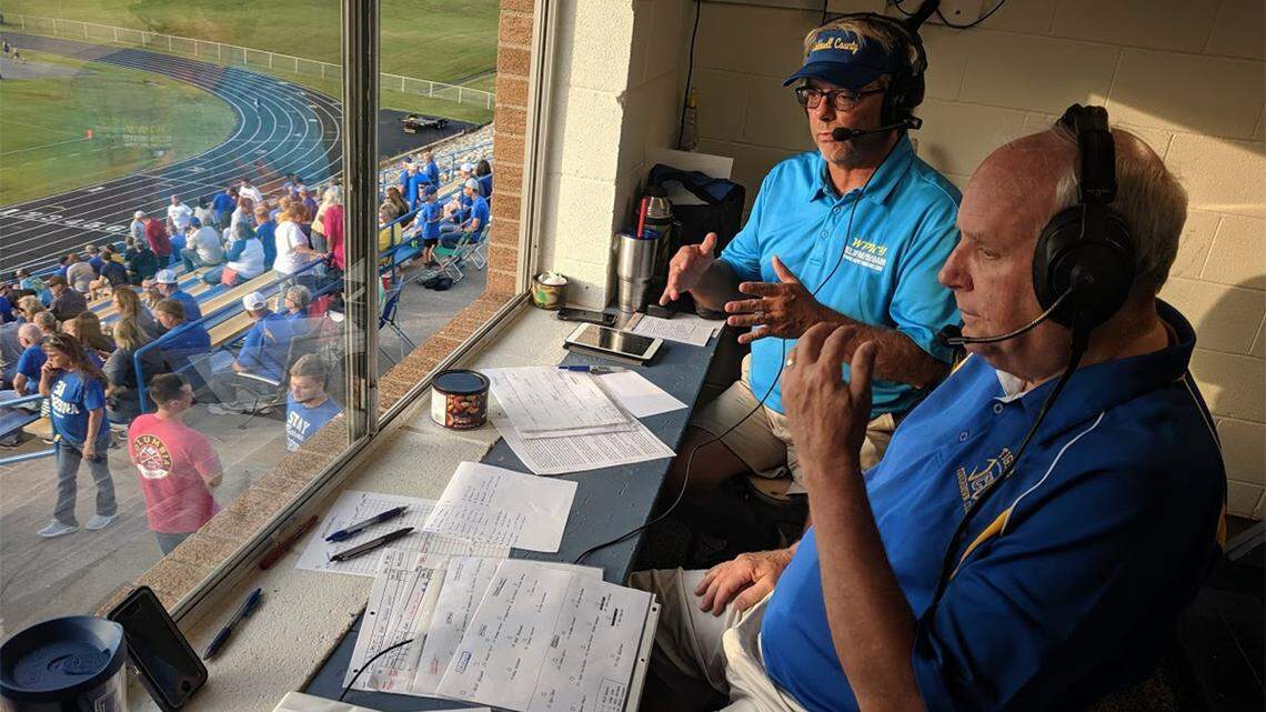 Broadcasters Dennis Stephens, left, and Bob Hayes have returned to broadcasting games after a tornado destroyed both their families’ homes.