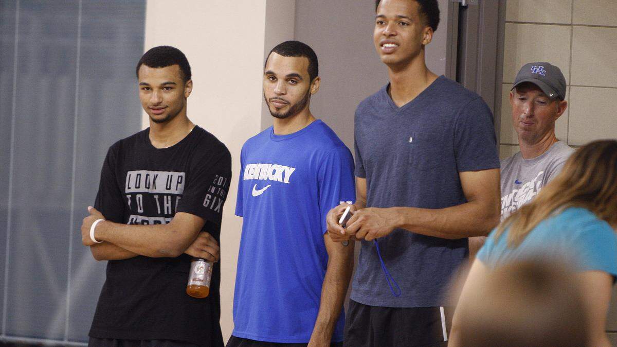 Kentucky recruits (from left) Jamal Murray (Canada), Mychal Mulder (Canada) and Skal Labissiere (Haiti) watched a scrimmage during UK Coach John Calipari's Pro Camp at the Joe Craft Center last weekend.  