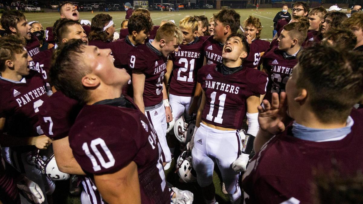 The Pikeville Panthers celebrated after their win against the Belfry Pirates at Hillard Howard Field in Pikeville.