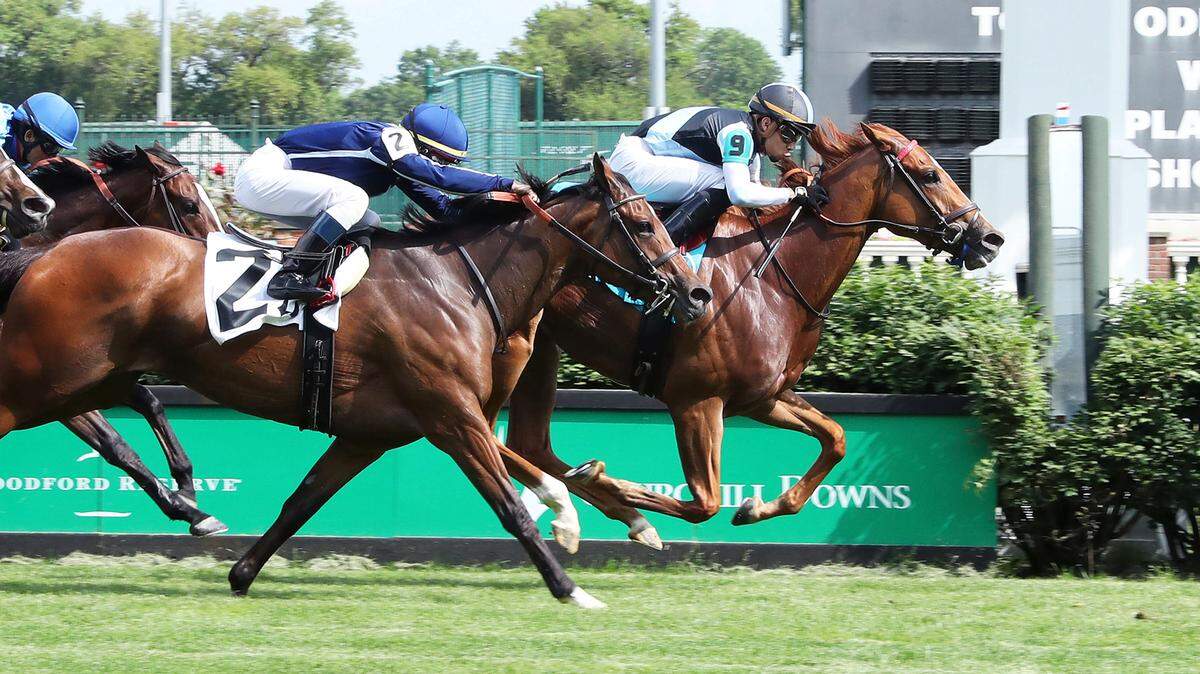 Sharing (background) edged Abscond (2) to win the Tepin Stakes at Churchill Downs in Louisville on Saturday.