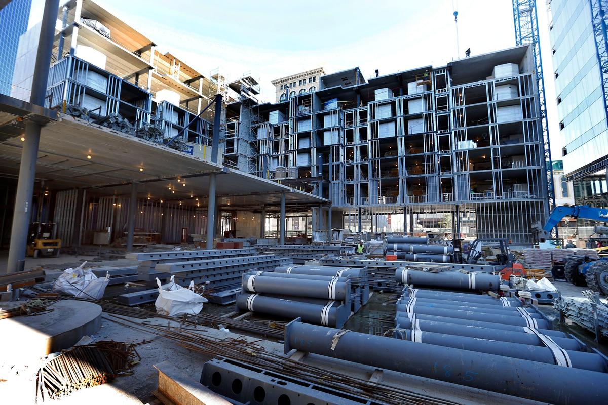 Components of the building skeleton, including posts and beams, and precast concrete slabs, are made off-site and shipped in as needed for the Marriott and Residence Inn at City Center. Both should be completed by fall of 2019.