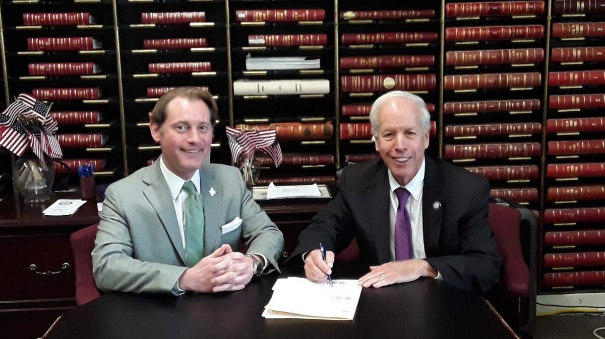 Rep. Joseph Fischer, R-Ft. Thomas, (right) is pictured with Secretary of State Michael Adams as he filed to run for the Kentucky Supreme Court’s Sixth District on Wednesday, Dec. 1, 2021.