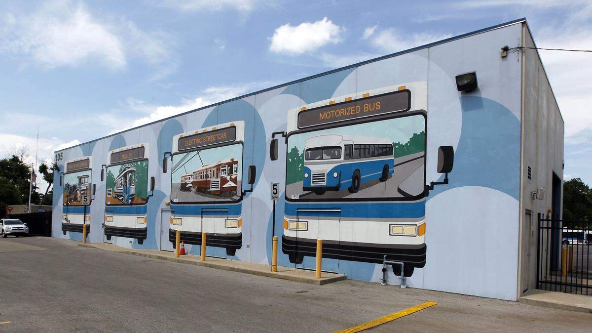 The former Lextran bus wash at 109 West Loudon Avenue will become the new home for Cosmic Charlie's, which plans to paint over the existing mural and have another created there.