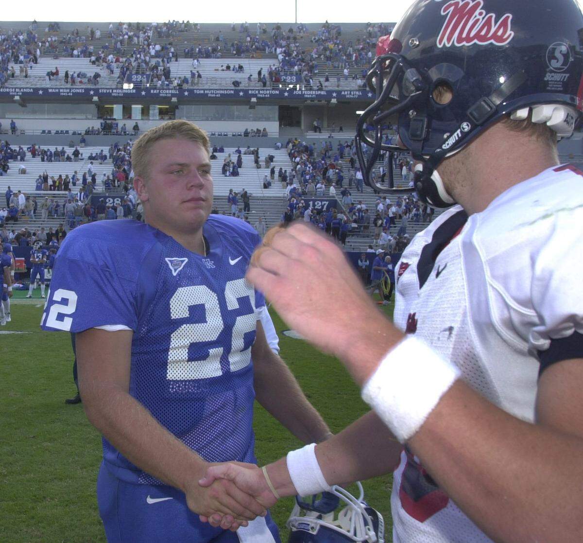 Kentucky quarterback Jared Lorenzen, left, shook hands with Mississippi QB Eli Manning, right, after Ole Miss defeated UK 42-31 at Commonwealth Stadium in 2001. Coming off the bench in relief of Wildcats starting quarterback Shane Boyd, Lorenzen went 5 of1 3 passing for 32 yards and had one carry for 15 yards.