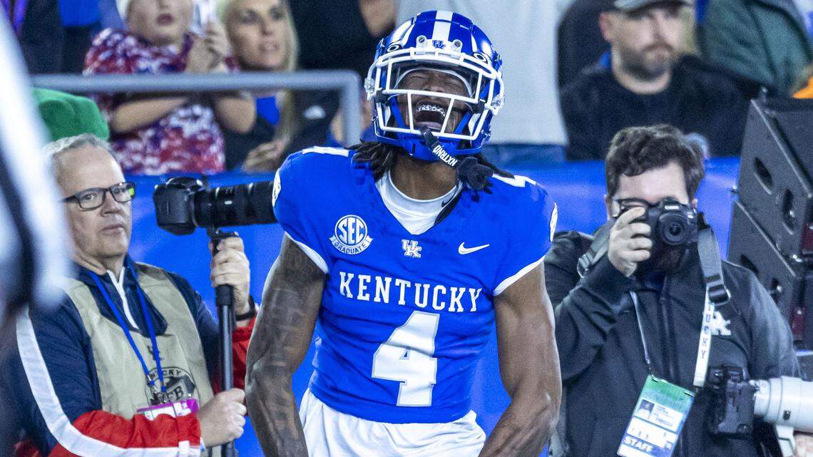 Kentucky wide receiver J.J. Hester celebrates a second-quarter touchdown during Saturday’s game against Florida at Kroger Field.