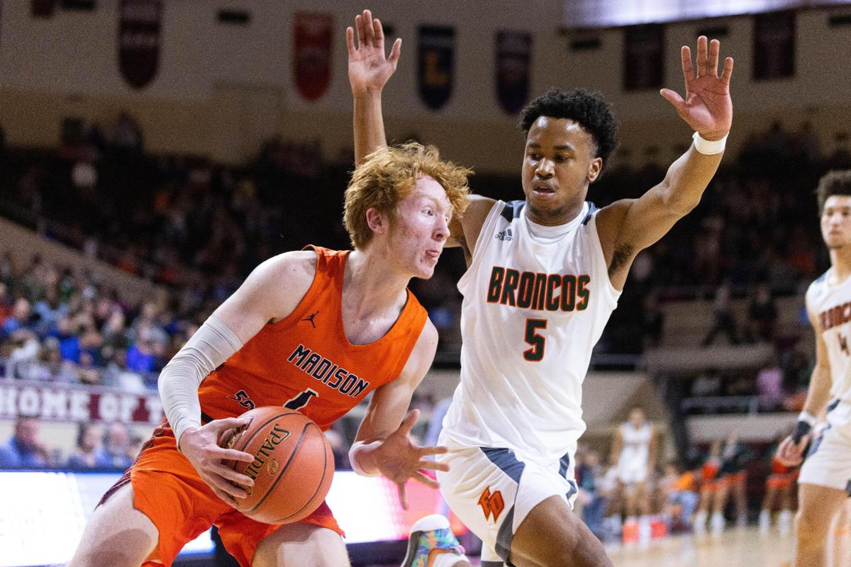 Madison Southern’s Jay Rose (1) drives the baseline during Friday night’s 11th Region Tournament semifinal against Frederick Douglass.