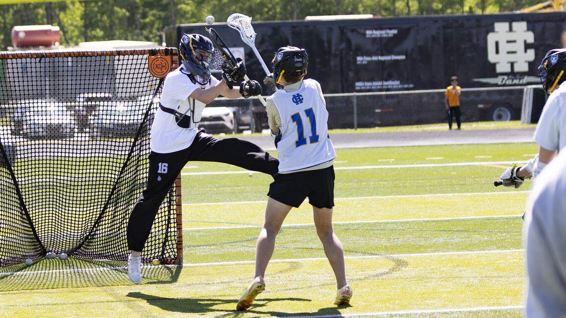 Henry Clay’s Max Thayer (11) takes a close-quarters shot on keeper Noah Gute during a practice at Henry Clay High School on Monday, April, 20, 2026 in Lexington, Kentucky.