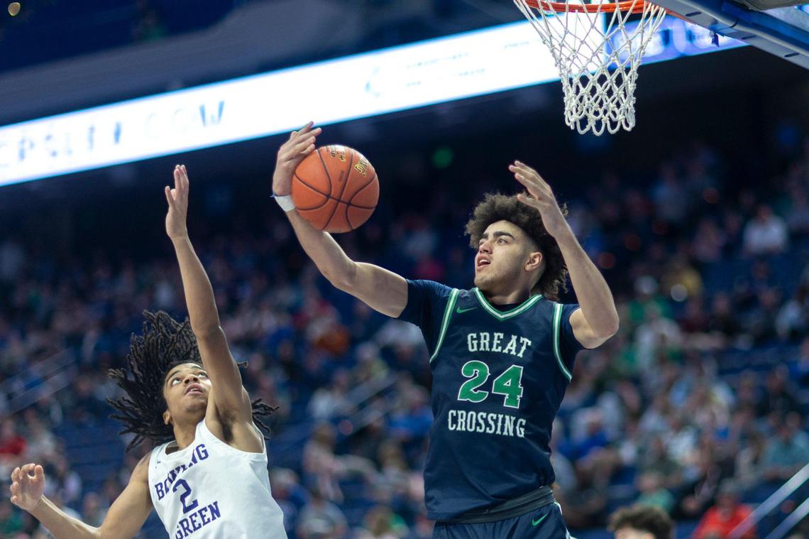 Great Crossing’s Malachi Moreno (24) grabs a rebound in front of Bowling Green’s Deuce Bailey (2) during the Boys’ Sweet 16 state tournament championship game in Rupp Arena last month. Moreno was named tournament MVP.