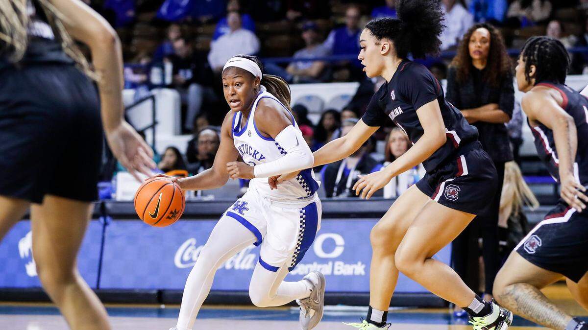 Kentucky guard Robyn Benton (1) drives to the basket against South Carolina during a game at Memorial Coliseum on Jan. 12.