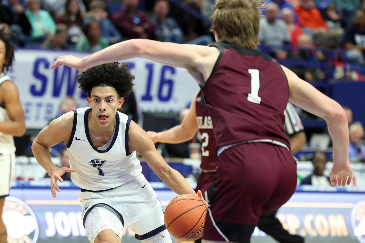 Warren Central’s Izayiah Villafuerte, left, drives against Pulaski County’s Brysen Dugger (1) during their first-round game Wednesday night. Villafuerte finished with eight points and four assists.
