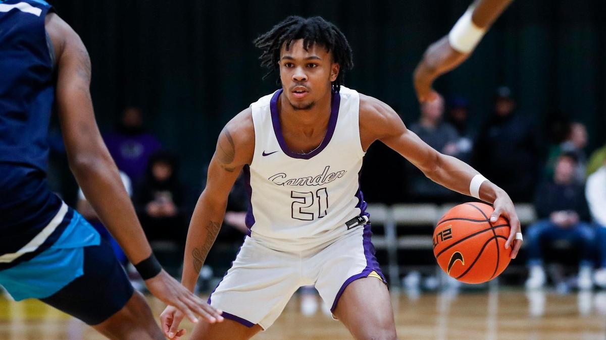 Camden (N.J.) High School senior guard and Kentucky men’s basketball 2023 signee DJ Wagner (21) dribbles the ball against Combine Academy (NC) during a game at the William Exum Center at Kentucky State University in Frankfort, Ky., Friday, February 3, 2023.