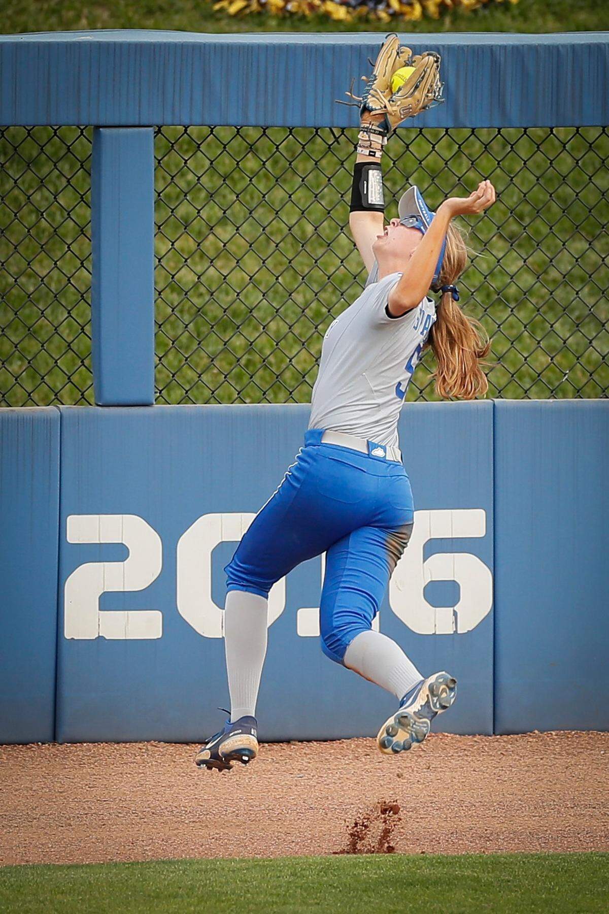 Kentucky Wildcats utility Tatum Spangler (5) catches a fly ball for an out during the NCAA Lexington Regionals against the Northwestern Wildcats at John Cropp Stadium in Lexington, Ky., Saturday, May 22, 2021. Kentucky beat Northwestern 7-2.