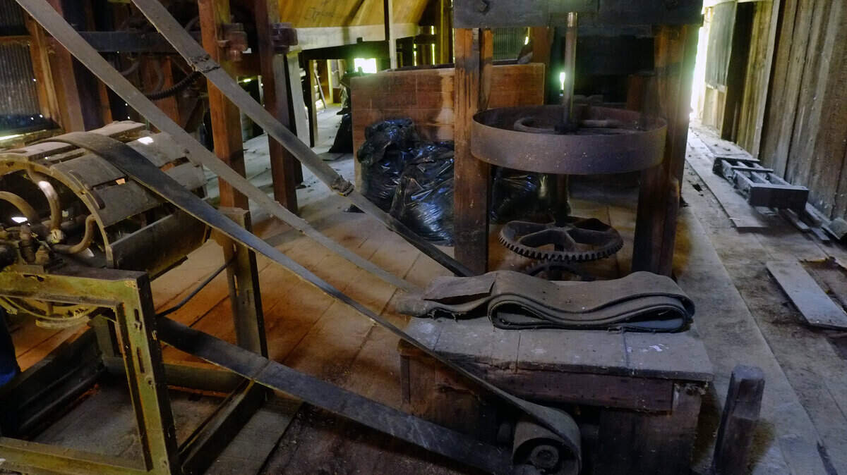This Madison County mill, which was built in 1865 and ceased operating in the 1930s, has most of its original equipment, including the leather belts than ran the machinery. Only the steam engine that powered the mill is gone.