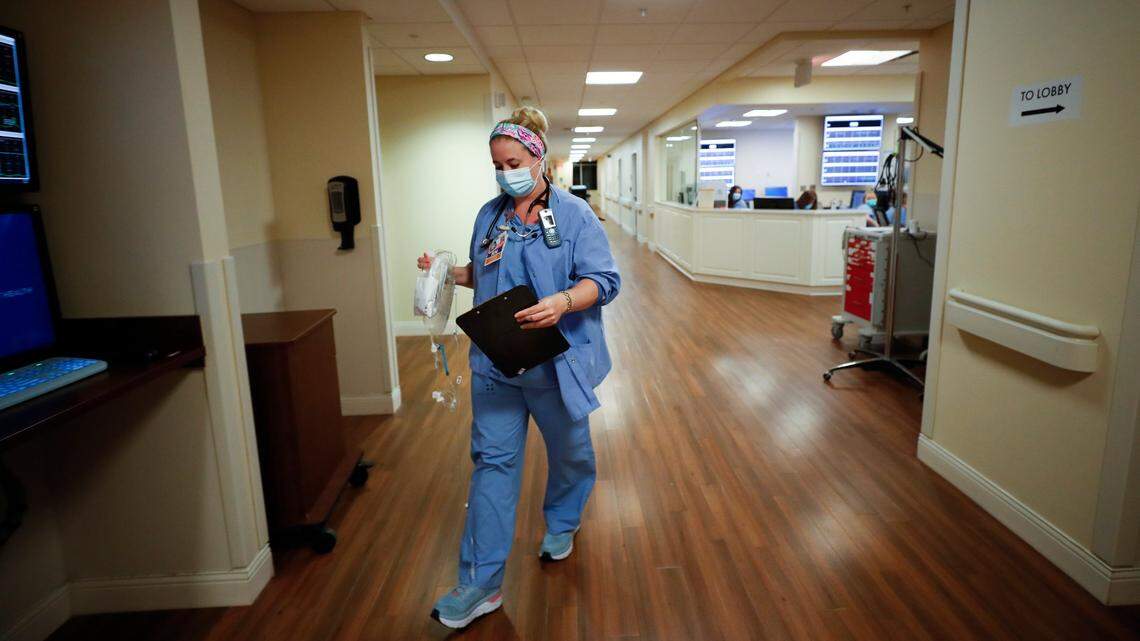 Cydney Kanis, of Lexington, Ky., a charge nurse at Baptist Health hospital works to admit a new mother in the maternity unit at Baptist Health in Lexington, Ky., Friday, July 9, 2021.