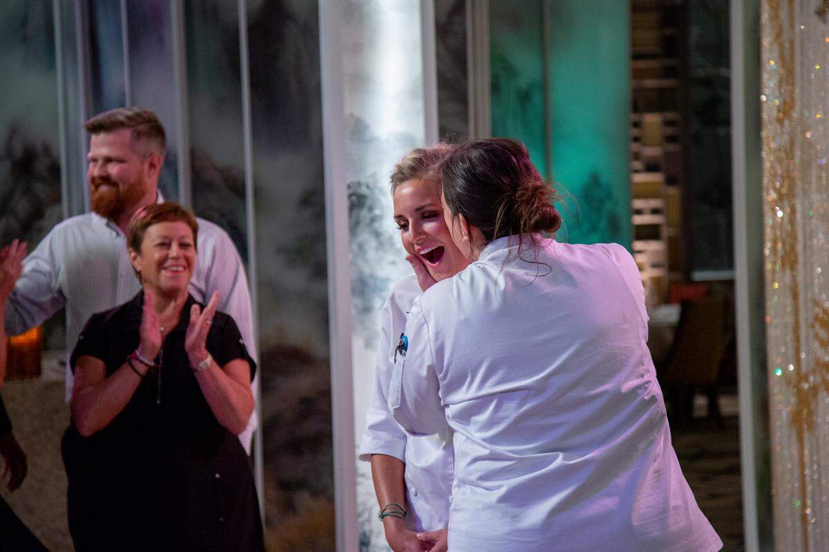 After host Padma Lakshmi announced that Kelsey was this season’s Top Chef, Sara gave her a big kiss on the cheek, as their husbands and mothers watched.