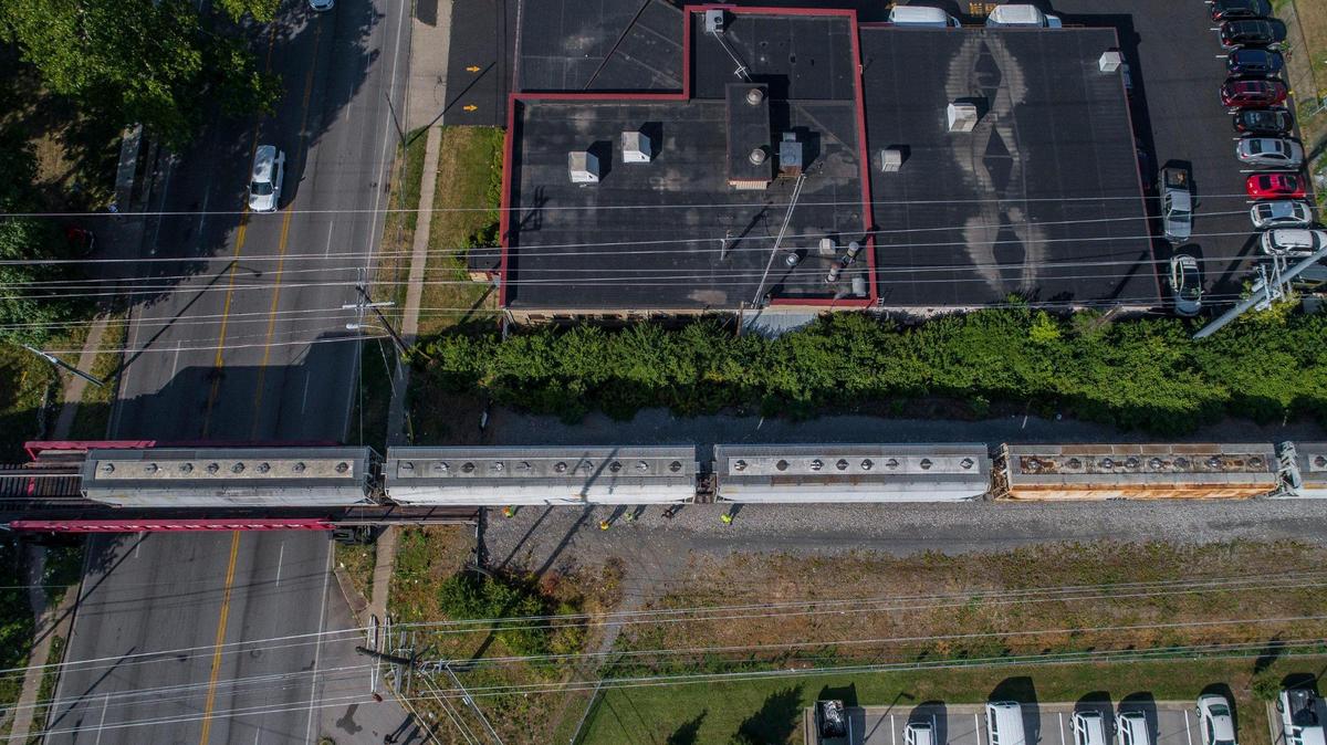 Law enforcement members respond to a report of a person being struck by a train near North Broadway in Lexington, Ky., on Friday, July 15, 2022.