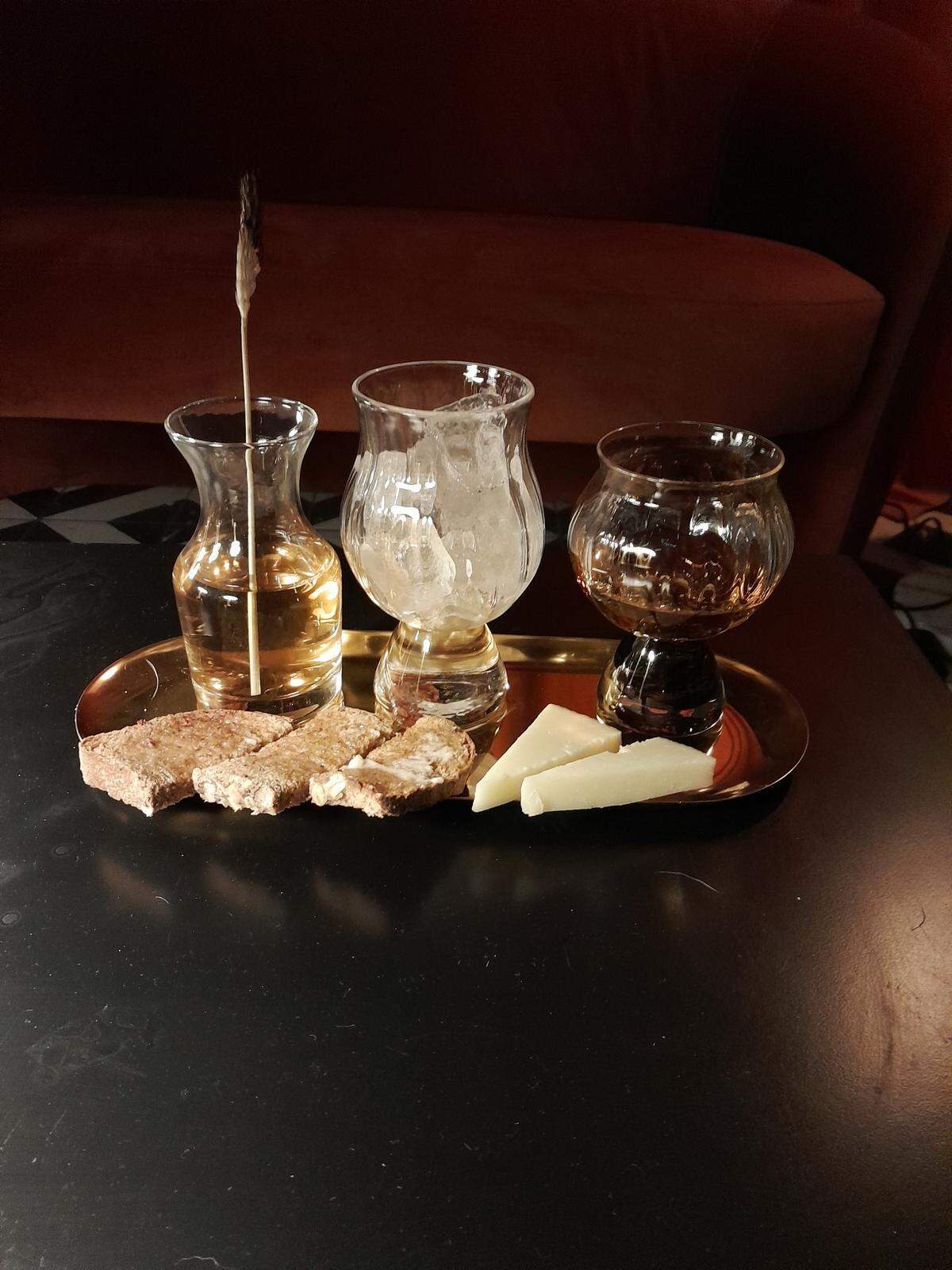 The Trifecta Glass Art Lounge offers more traditional drinks like the Bourbon Bloom.