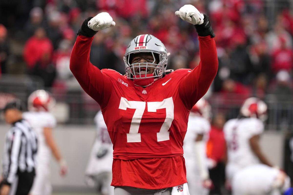 COLUMBUS, OHIO - NOVEMBER 23: Offensive lineman Tegra Tshabola #77 of the Ohio State Buckeyes celebrates during the game against the Indiana Hoosiers at Ohio Stadium on November 23, 2024 in Columbus, Ohio. (Photo by Jason Mowry/Getty Images)