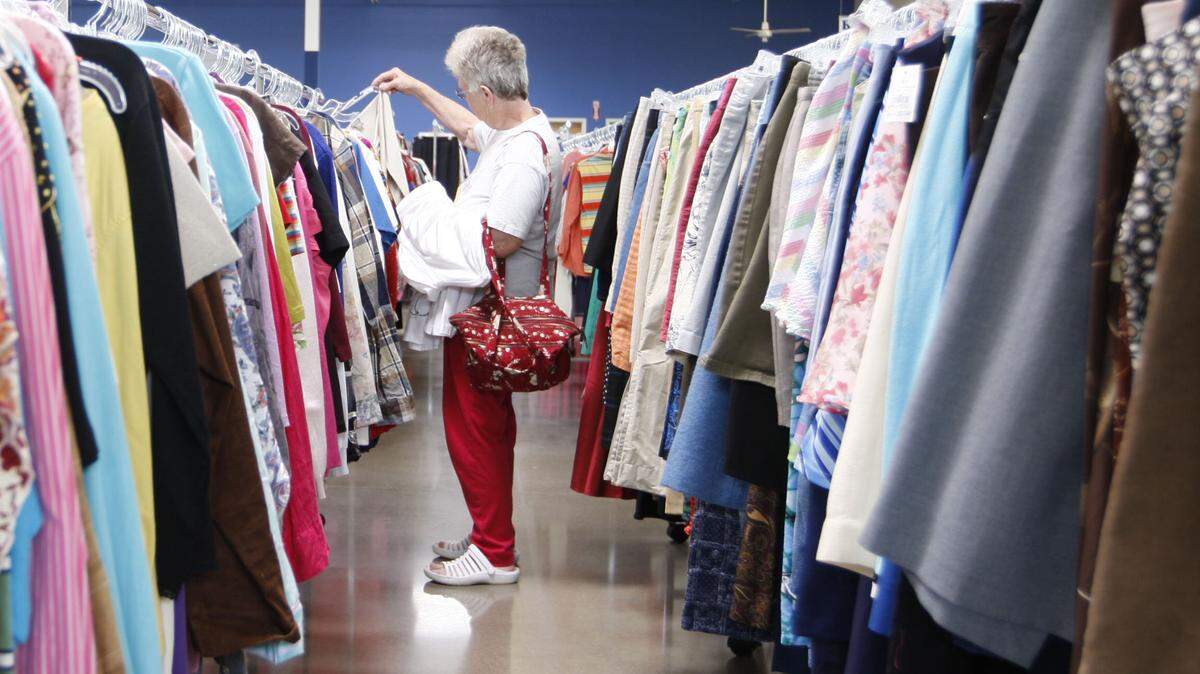 In this 2011 file photo, Kathleen Gorz shopped for blouses at a Goodwill store in Paris last month.