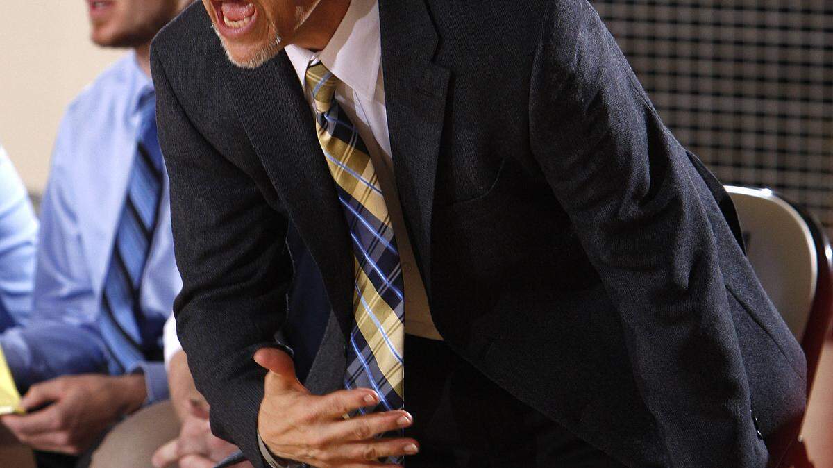 Paul Dunbar hired Scott Chalk, shown here coaching Franklin County in March, to replace Justin Yeary as the boys' basketball coach. Chalk guided Frankfort to five consecutive All "A" Classic tournaments and four regional tournaments before taking over at Franklin County.       