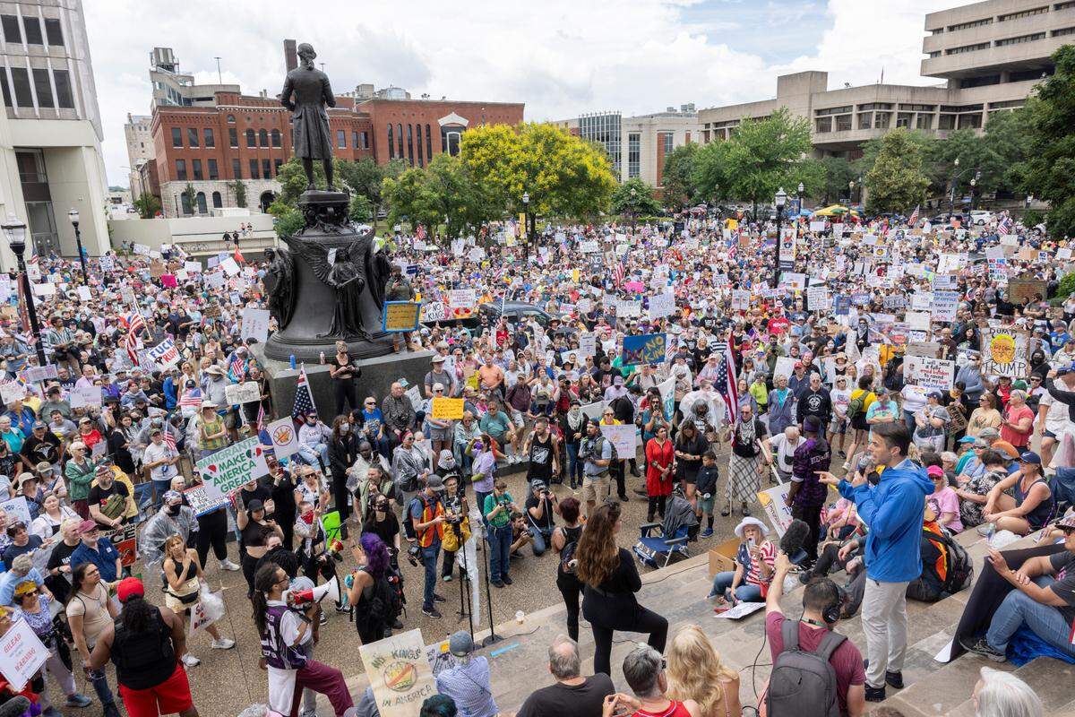 Congressman Morgan McGarvey speaks to the thousands of demonstrators gathered during the ‘No Kings’ march and protest at Metro Hall in downtown Louisville, Kentucky, Saturday, June 14, 2025. ‘No Kings’ rallies organized across the United States in direct response to President Donald Trump’s military parade in Washington D.C.