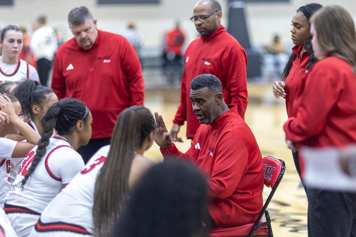 George Rogers Clark head coach Robbie Graham talks to his team during a timeout in a game against Sacred Heart at GRC Arena in Winchester on Feb. 12.