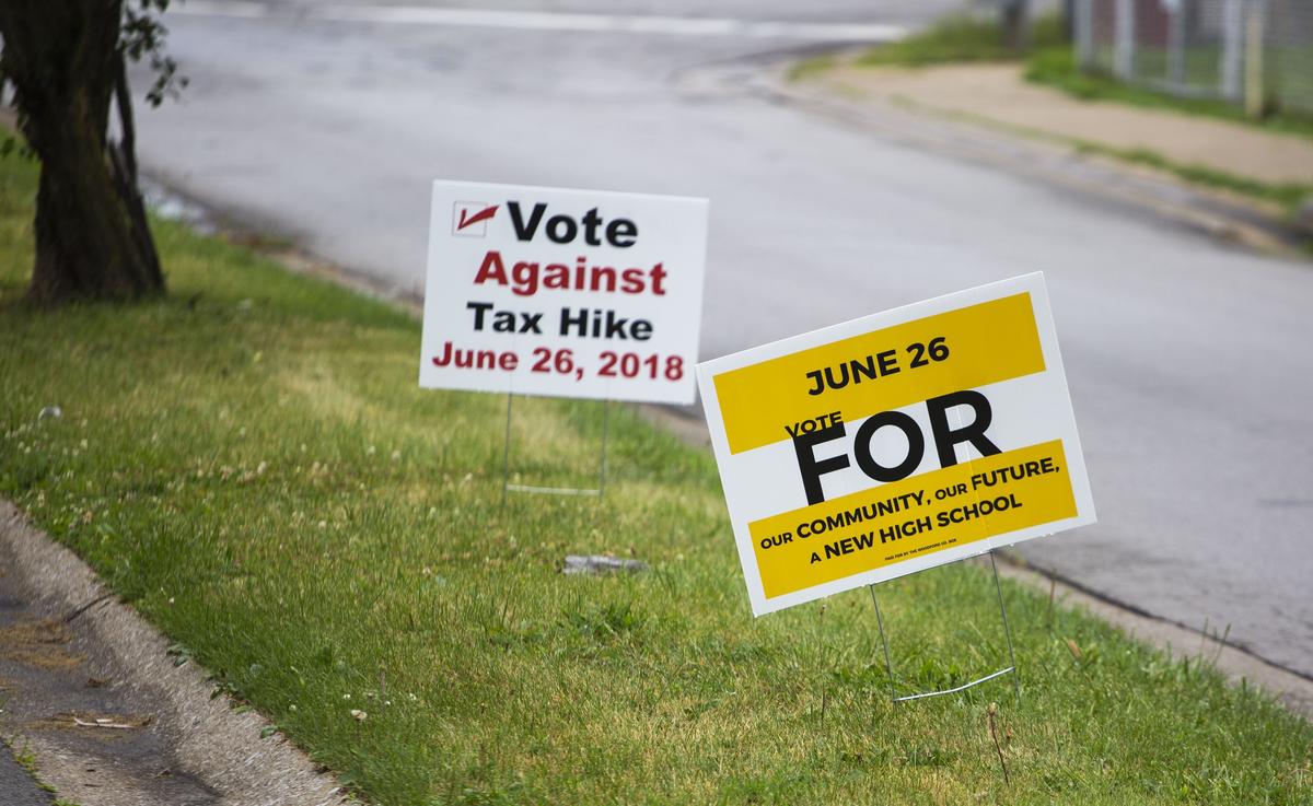 Yard signs dotted the roadways and sidewalks in Woodford County ahead of the special referendum Tuesday on a higher tax rate aimed at helping to finance a new high school.