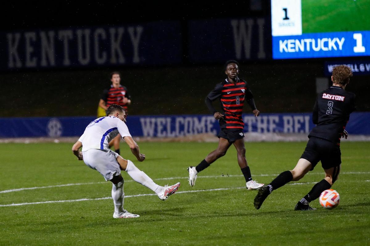 Kentucky’s Max Miller, left, scores against Dayton during Wednesday’s match at the Wendell & Vickie Bell Soccer Complex.