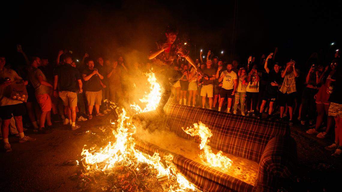Crowds, fires, flipped car reported on State Street after UK football win over Florida